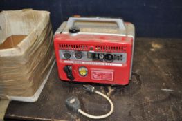 A VINTAGE HONDA E300 PETROL GENERATOR, with a 3 pin euro plug socket, and 12v outlets, an adaptor