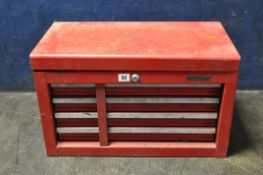 A RED TOOL CHEST, containing a selection of hand tools including rack clamp, micrometer, precision