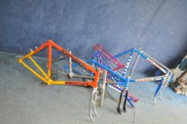 SEVEN MID TO LATE 20th CENTURY BICYCLE FRAMES AND A QUANTITY OF ALUMINIUM WHEELS, some pairs, some