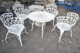 A WHITE PAINTED CAST IRON GARDEN SET, comprising a table, diameter 79cm x height 67cm, and a set