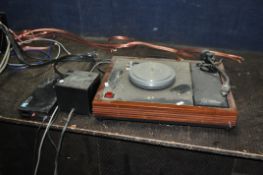 A LINN SONDEK LP12 TURNTABLE with a FR Research tone arm and a PS Audio phono preamp with power