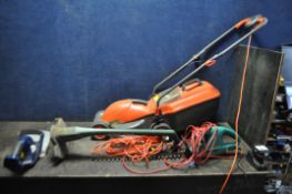 A FLYMO VISIMO ELECTRIC LAWN MOWER, a Bosch hedge trimmer, a Black and Decker strimmer, and a