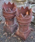A PAIR OF TERRACOTTA CHIMNEY POTS diameter 31cm x height 72, condition report: both aged and