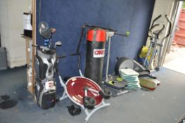 A SELECTION OF EXERCISE AND SPORTING EQUIPMENT, including a York elliptical, a Carta heavy punch bag