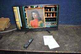 A SONY KD 32W800 32in SMART TV, with remote and manual (PAT pass and working)