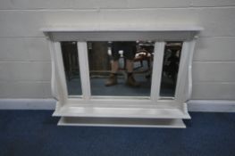 A WHITE PAINTED OVERMANTEL MIRROR, with three bevelled mirror panes, width 123cm x height 96cm,