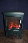 A DUNELM STOVE EFFECT HEATER, in green, height 56cm (PAT pass and working)