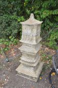 A MODERN CONCRETE GARDEN STRUCTURE, in the form of a five section pagoda, height 142cm. Condition