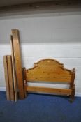 A MODERN PINE 4FT6 BEDSTEAD, condition report: marks, scuffs, discolouration, other wear and usage