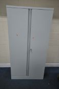 A DOUBLE DOOR METAL CABINET, with three adjustable shelves, width 92cm x depth 46cm x height