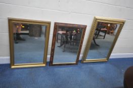 THREE GILT WOOD WALL MIRRORS, two of them being bevelled edge, largest mirror 106cm x 77cm,