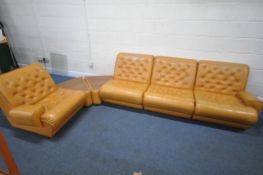 A MID-CENTURY BUTTONED LEATHERETTE MODULAR SOFA, comprising two ends with armrests, two middle
