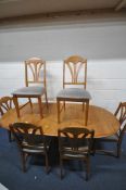 JENTIQUE, AN ELM OVAL EXTENDING DINING TABLE, with one additional leaf, length 158cm x depth 100cm x