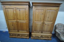 TWO MODERN PINE DOUBLE DOOR WARDROBES, each with two drawers, largest width 129cm x depth 62cm x