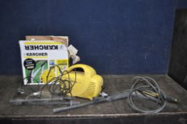A KARCHER K1.22H PRESSURE WASHER, with lance, three nozzles and tatty original box (PAT pass and