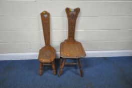 TWO 20TH CENTURY OAK SPINNING STOOLS, each with foliate carved details, raised on turned legs,