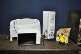 A COLLECTION OF HOUSEHOLD ELECTRICAL ITEMS, including two DeLonghi heaters, a Tesco microwave, a