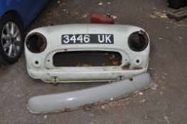 A FIBRE GLASS CLASSIC MINI FLIP FRONT END, a fibre glass rear valance and a steel petrol tank (3)