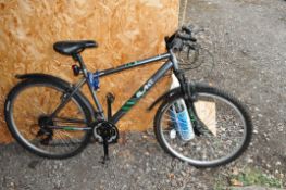 AN APOLLO SLANT MOUNTAIN BIKE, with 18 speed Shimano twist grip gears and 17in frame
