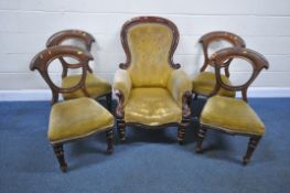 A VICTORIAN MAHOGANY BUTTONED SPOON BACK ARMCHAIR, with scrolled armrests, raised on turned front