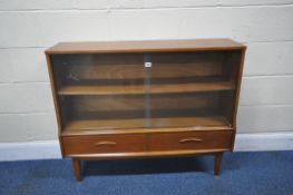 POSSIBLY JENTIQUE, A MID-CENTURY TEAK BOOKCASE, with double glass sliding doors, over two drawers,