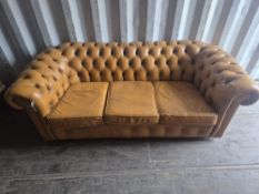 A TAN LEATHER THREE SEATER CHESTERFIELD SOFA, 192cm x depth 92cm x height 65cm, condition report:
