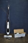 A BOSCH ATHLETE CORDLESS VACUUM CLEANER, with power supply, and a Dunelm hand held vacuum cleaner