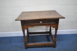 A GEORGIAN OAK SIDE TABLE, with a single frieze drawer, a shaped front apron, raised on block and