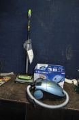 A HOOVER POWERLITE VACUUM CLEANER with original box and some accessories along with a G Tech Air ram