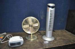 A HONEYWELL TOWER FAN with remote, a Joseph Gleave fan heater and a gold coloured table fan (3)(