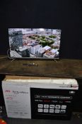 A JVC LT-43CF700 43in SMART TV with remote, manual and original packaging (PAT pass and working)