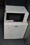 A FRIGIDAIRE TABLE TOP FREEZER width 50cm, depth 50cm, height 51cm along with a Cookworks