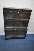 AN EARLY 20TH CENTURY MAHOGANY GLOBE WERNICKE STYLE ELASTIC BOOKCASE, with hide and fall glass