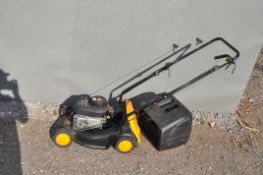 A McCULLOCK 40-450CP PETROL LAWN MOWER with grass box. Condition Report: engine pulls freely but