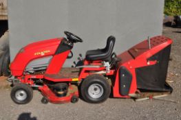 A COUNTAX RIDE ON LAWN MOWER with grass box, a Honda C400H engine, 352 hours on display panel,