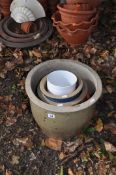 THREE GLAZED, A CERAMIC AND A PLASTIC PLANT POTS the largest being 40cm in diameter (5)