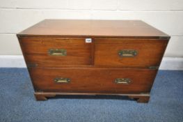 A 20TH CENTURY MAHOGANY CAMPAIGN CHEST OF TWO SHORT OVER ONE LONG DRAWER, with brass banding and