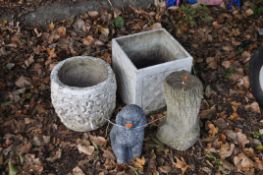 FOUR CONCRETE GARDEN ITEMS including a poodle figure, a tree stump base and two planters