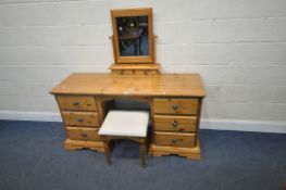 SCHREIBER, A MODERN PINE DRESSING TABLE, fitted with six drawers, length 156cm x depth 52cm x height