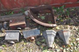 A COLLECTION OF VICTORIAN AND LATER CAST IRON ITEMS including a corner water feeder and five rain