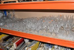 A LARGE QUANTITY OF GLASSWARE, to include seventeen sets/part sets of drinking glasses, with pairs