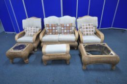 A RATTAN SIX PIECE CONSERVATORY SUITE, comprising a two seater sofa, length 128cm x depth 76cm x