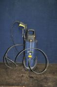 A PERFORMANCE PRO PRESSURE WASHER with one lance, two nozzles and brush (PAT pass and working but