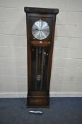 AN EARLY 20TH CENTURY OAK LONGCASE CLOCK, the door with a convex glass pane over rectangular
