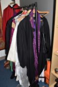 A LARGE QUANTITY OF ECCLESIASTICAL VESTMENTS of various style and purpose, for various liturgical