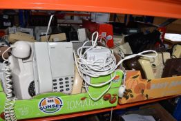 FOUR BOXES OF VINTAGE TELEPHONES, to include home and office examples, brands include BT, Panasonic,