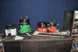 THREE VACUUM CLEANERS BY NUMATIC comprising of a 'George' wet and dry with water container,