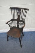 AN ARTS AND CRAFTS SPLAT BACK ARMCHAIR, with a heart design to the central splat, dished seat,