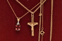 A 9CT GOLD GEM SET AND DIAMOND PENDANT TOGETHER WITH A 9CT GOLD CROSS PENDANT AND CHAIN, the 9ct