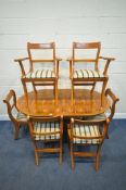 A LATE 20TH CENTURY YEW WOOD OVAL EXTENDING DINING TABLE, with one additional leaf, raised on a